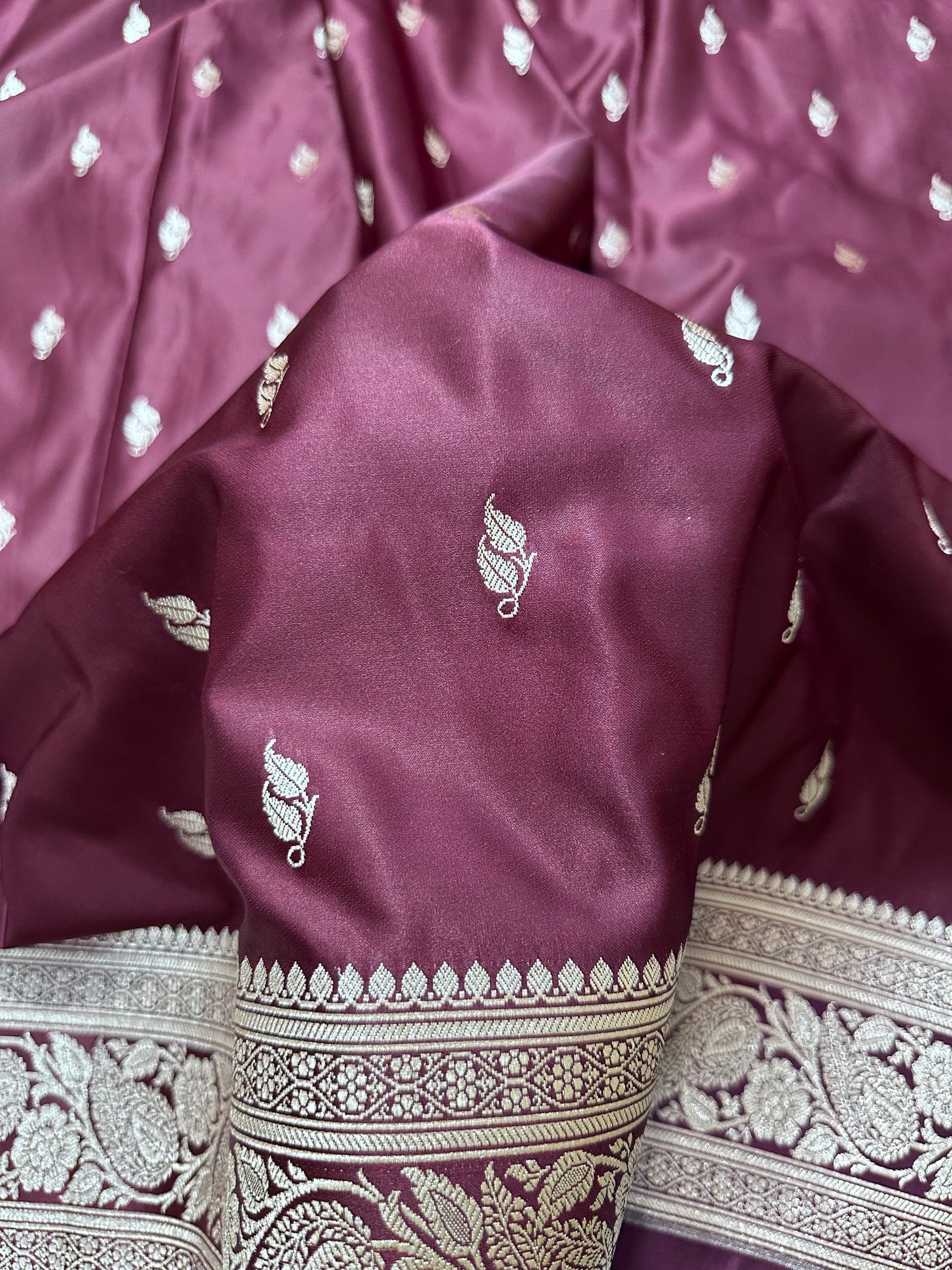 Deep Wine Katan Silk Banarasi Saree with Heritage Copper Zari Kalka Bel Border and Sleek Leaf Sprigs