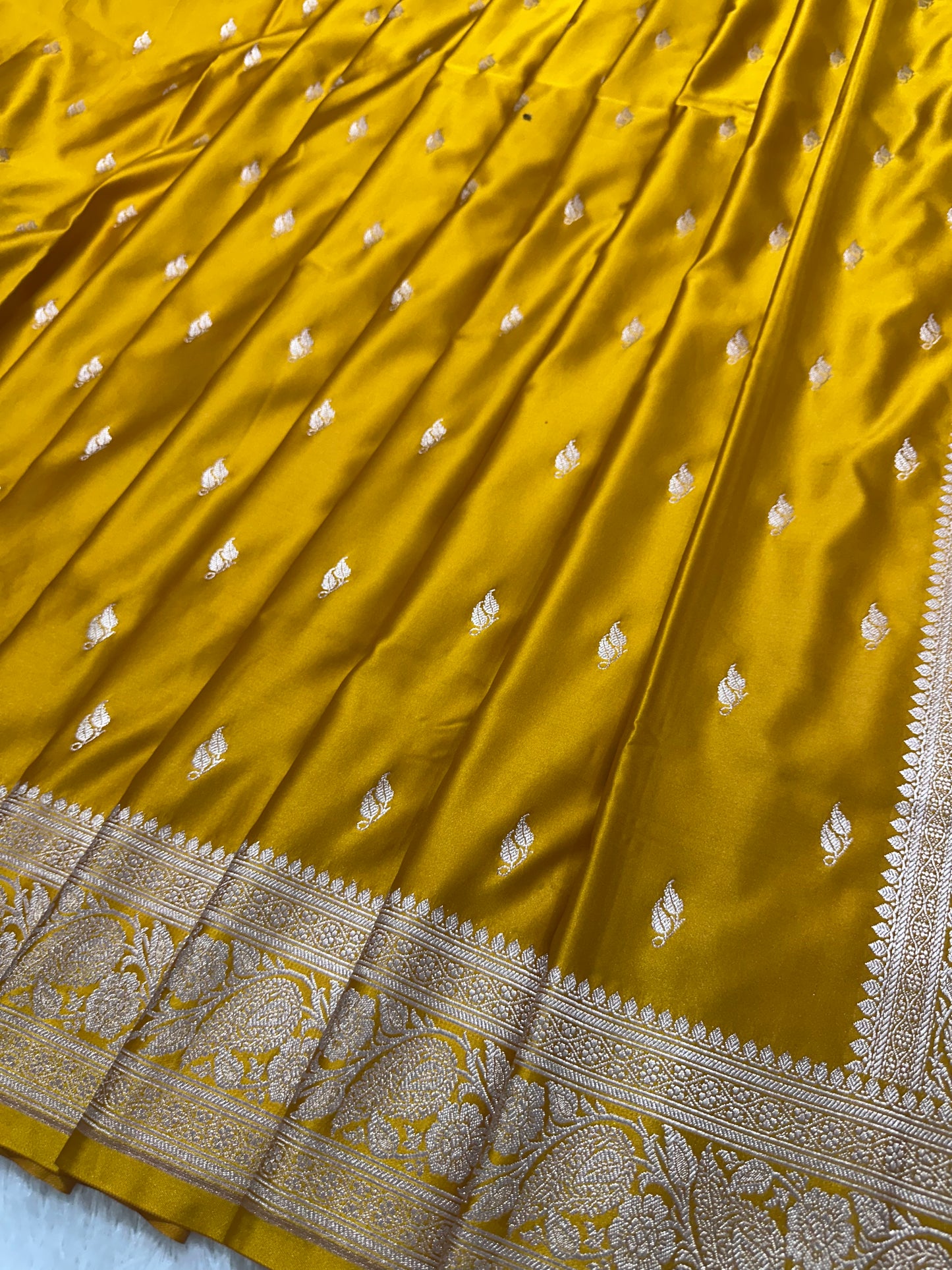 Mustard Yellow Katan Silk Banarasi Saree with Classic Copper Zari Kalka Bel Border and Sleek Leaf Sprigs