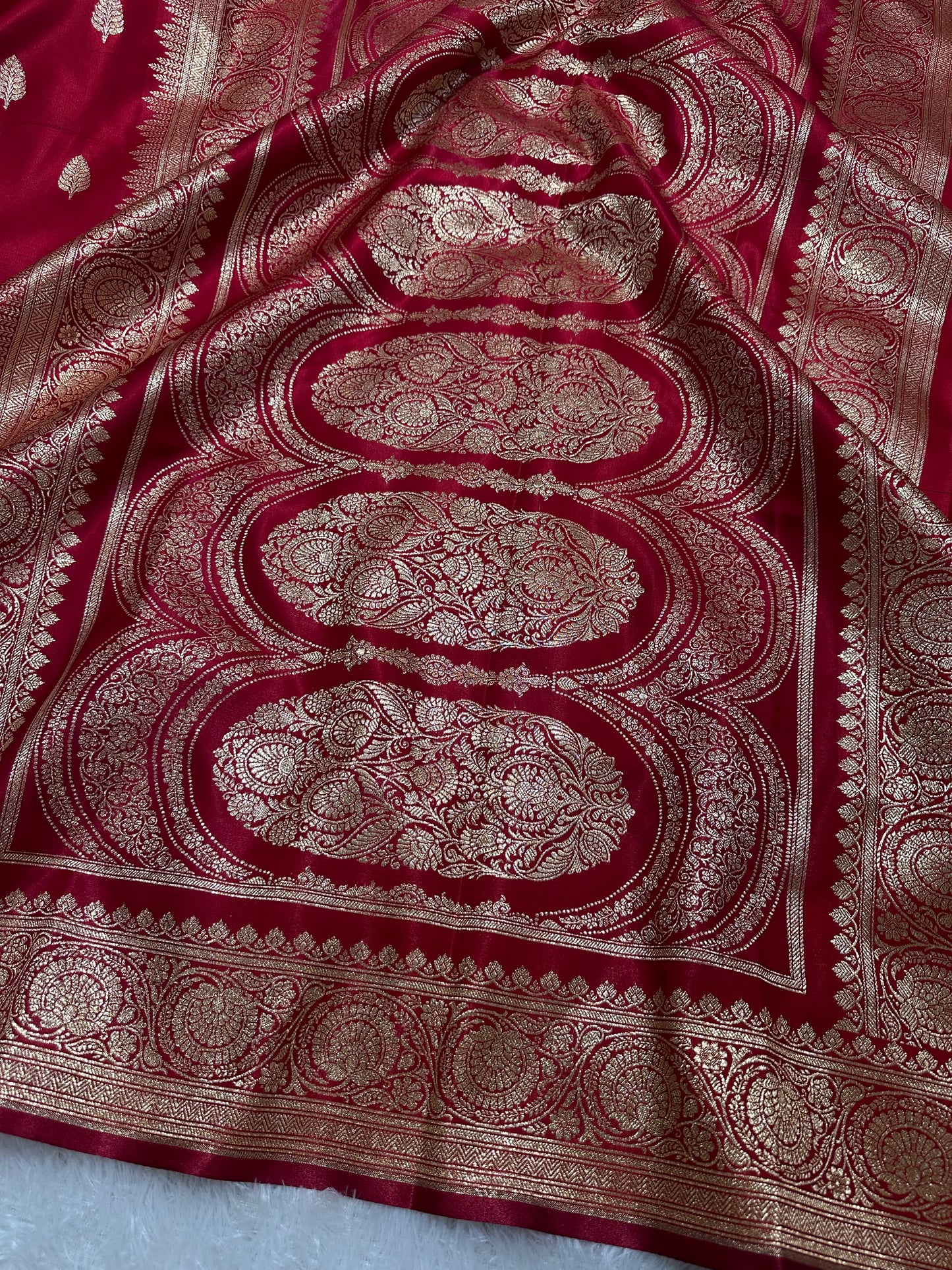 Crimson Red Satin Silk Banarasi Saree with Royal Guldasta Chakra Border and Bold Gold Panna Butis