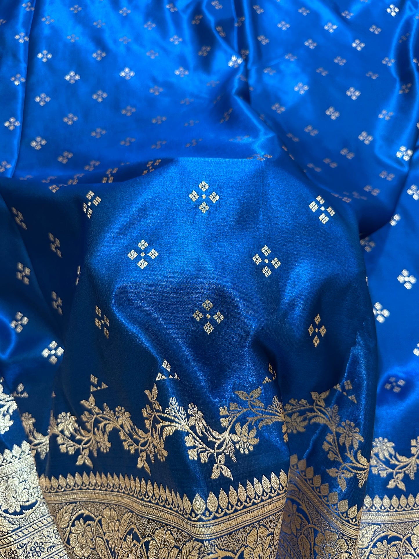 Royal Peacock Blue Satin Silk Banarasi Saree with Royal Floral Jhallar Border and Geometric Chowk Butis