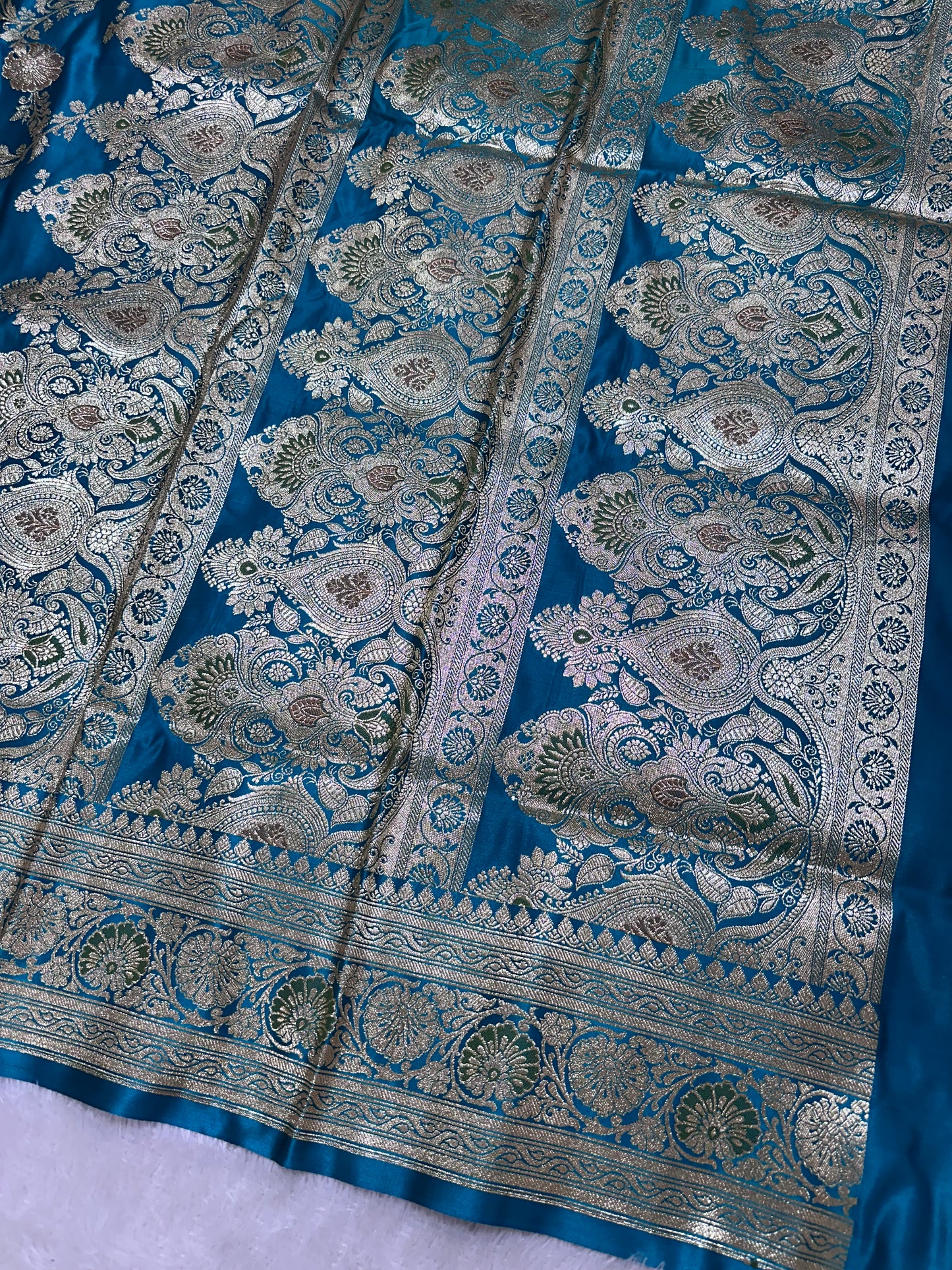 Premium Peacock Blue Katan Silk Banarasi Saree with Traditional Floral Vine Jaal and Ornate Zari Border