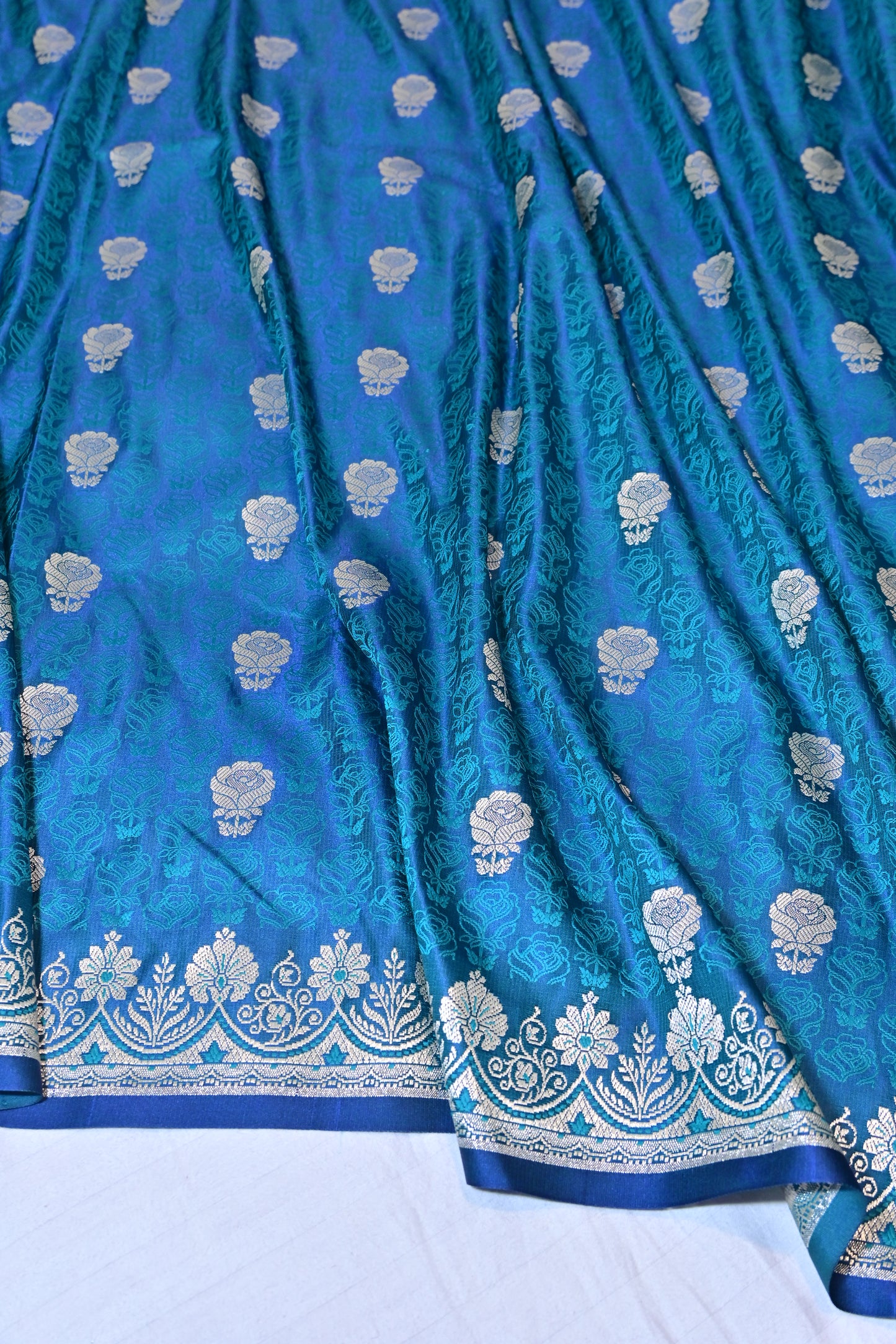 Premium Firozi Katan Banarasi Silk Saree with Silver Zari Floral Buta – Traditional Wedding & Festive Wear