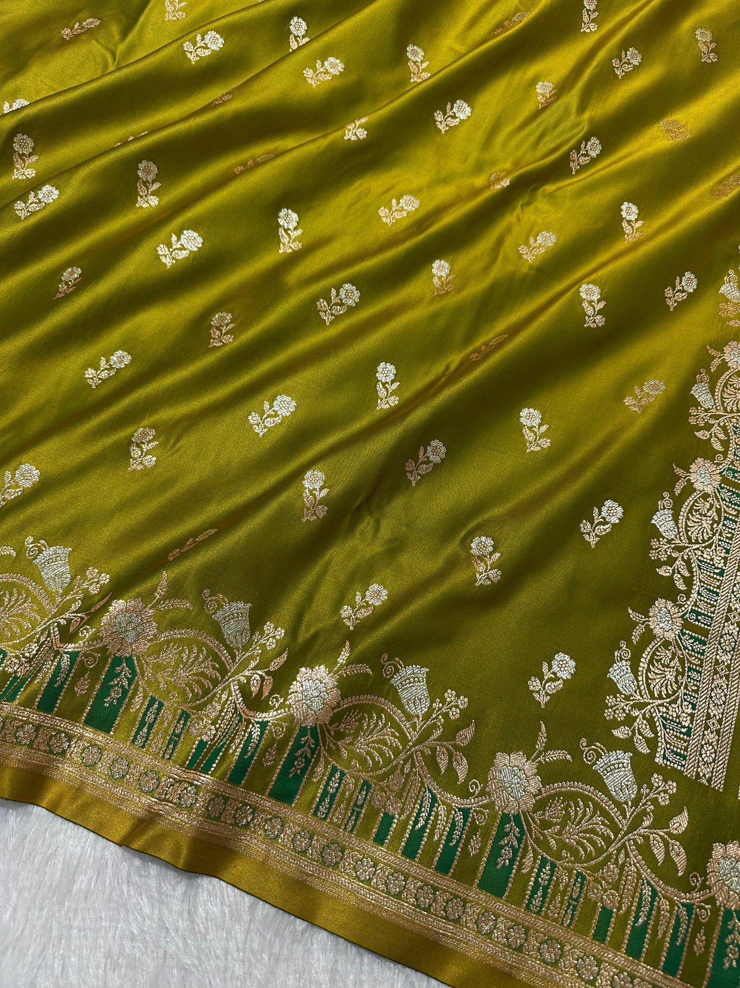 Premium Mehndi Green Banarasi Silk Saree With Elegant Double Zari Buti Border