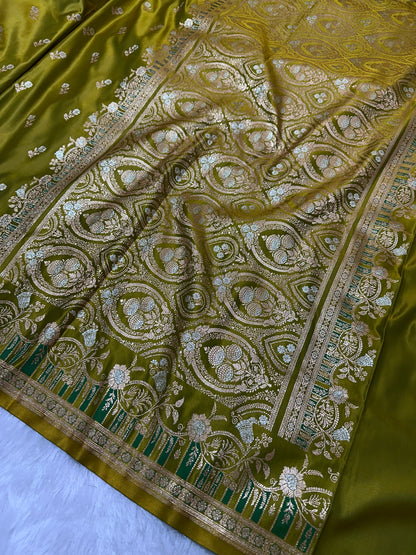 Premium Mehndi Green Banarasi Silk Saree With Elegant Double Zari Buti Border