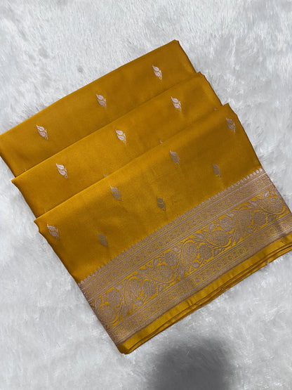Mustard Yellow Katan Silk Banarasi Saree with Classic Copper Zari Kalka Bel Border and Sleek Leaf Sprigs