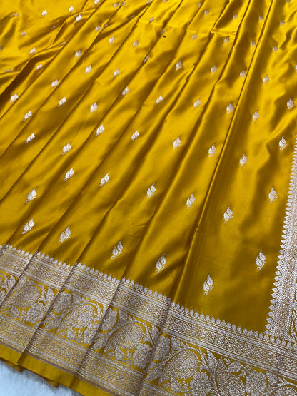 Mustard Yellow Katan Silk Banarasi Saree with Classic Copper Zari Kalka Bel Border and Sleek Leaf Sprigs