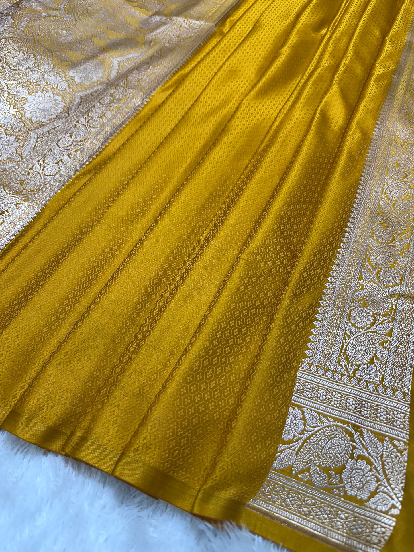Mustard Yellow Katan Silk Banarasi Saree with Classic Copper Zari Kalka Bel Border and Sleek Leaf Sprigs