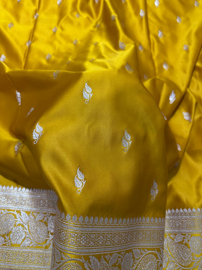 Mustard Yellow Katan Silk Banarasi Saree with Classic Copper Zari Kalka Bel Border and Sleek Leaf Sprigs