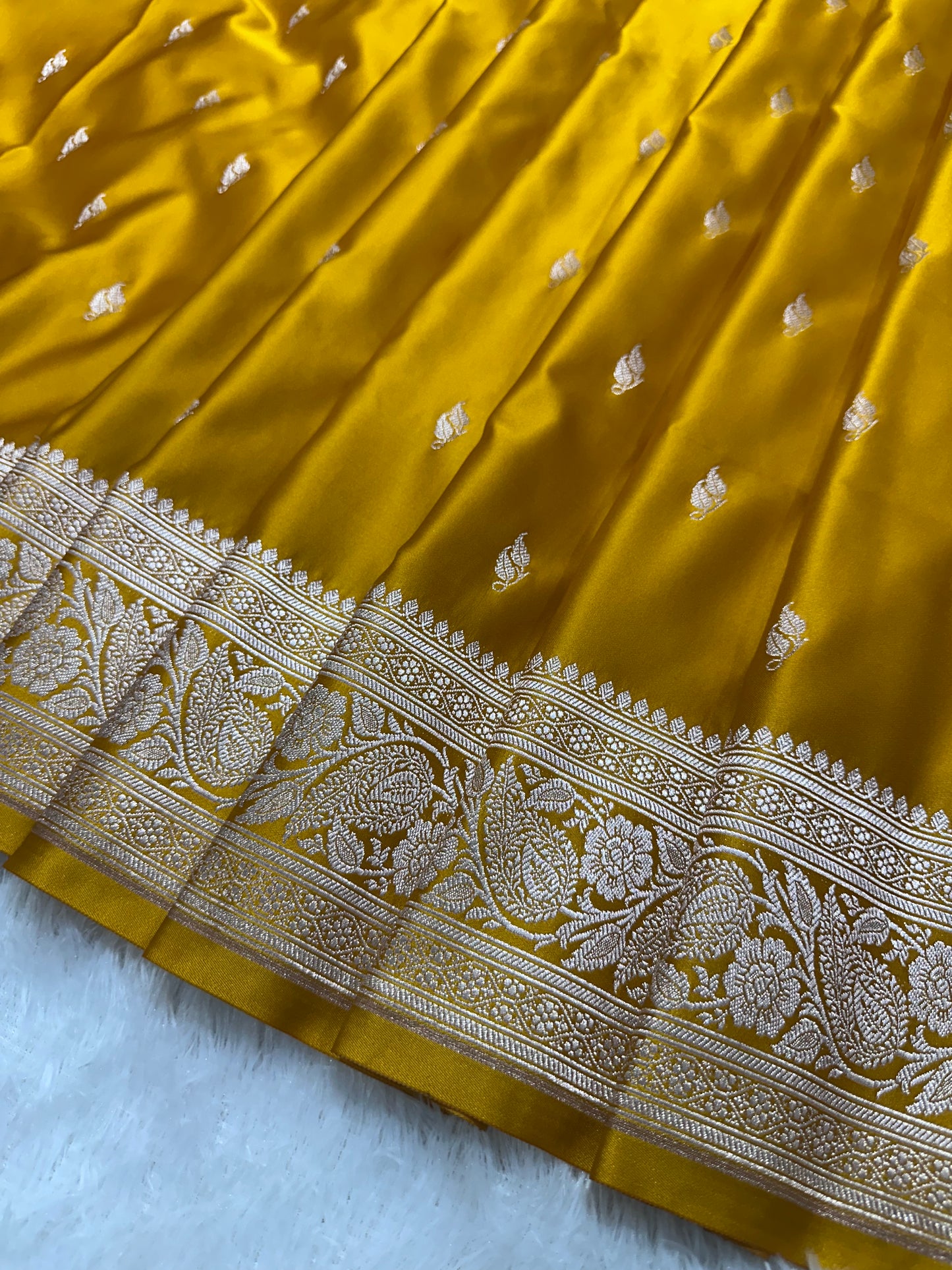 Mustard Yellow Katan Silk Banarasi Saree with Classic Copper Zari Kalka Bel Border and Sleek Leaf Sprigs