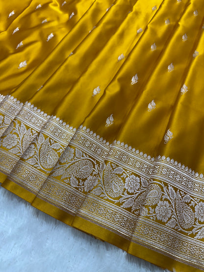 Mustard Yellow Katan Silk Banarasi Saree with Classic Copper Zari Kalka Bel Border and Sleek Leaf Sprigs