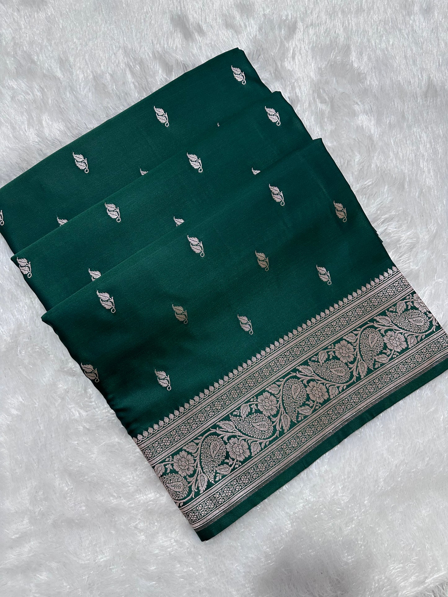 Bottle Green Katan Silk Banarasi Saree with Heritage Copper Zari Kalka Bel Border and Sleek Leaf Sprigs