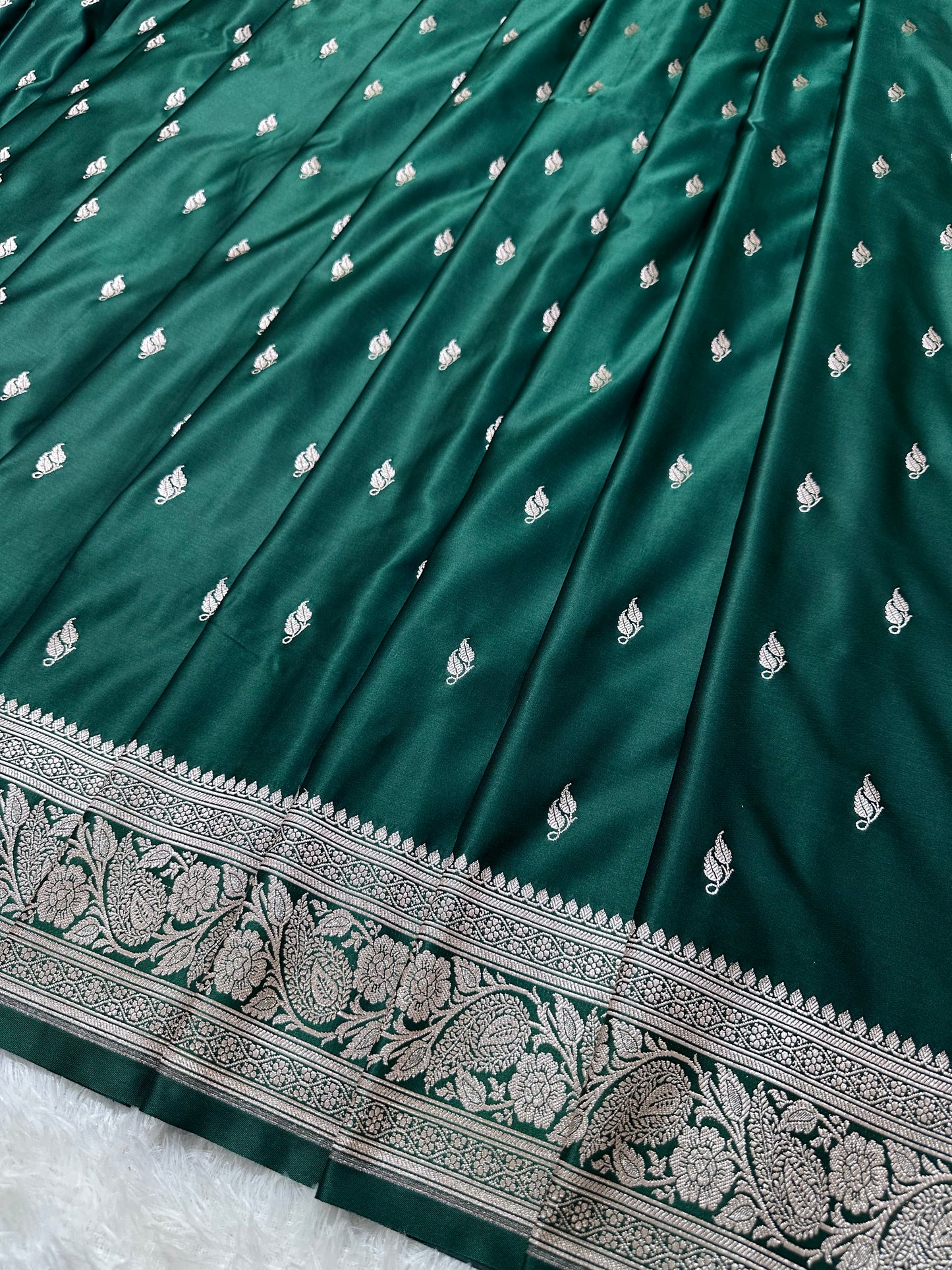 Bottle Green Katan Silk Banarasi Saree with Heritage Copper Zari Kalka Bel Border and Sleek Leaf Sprigs
