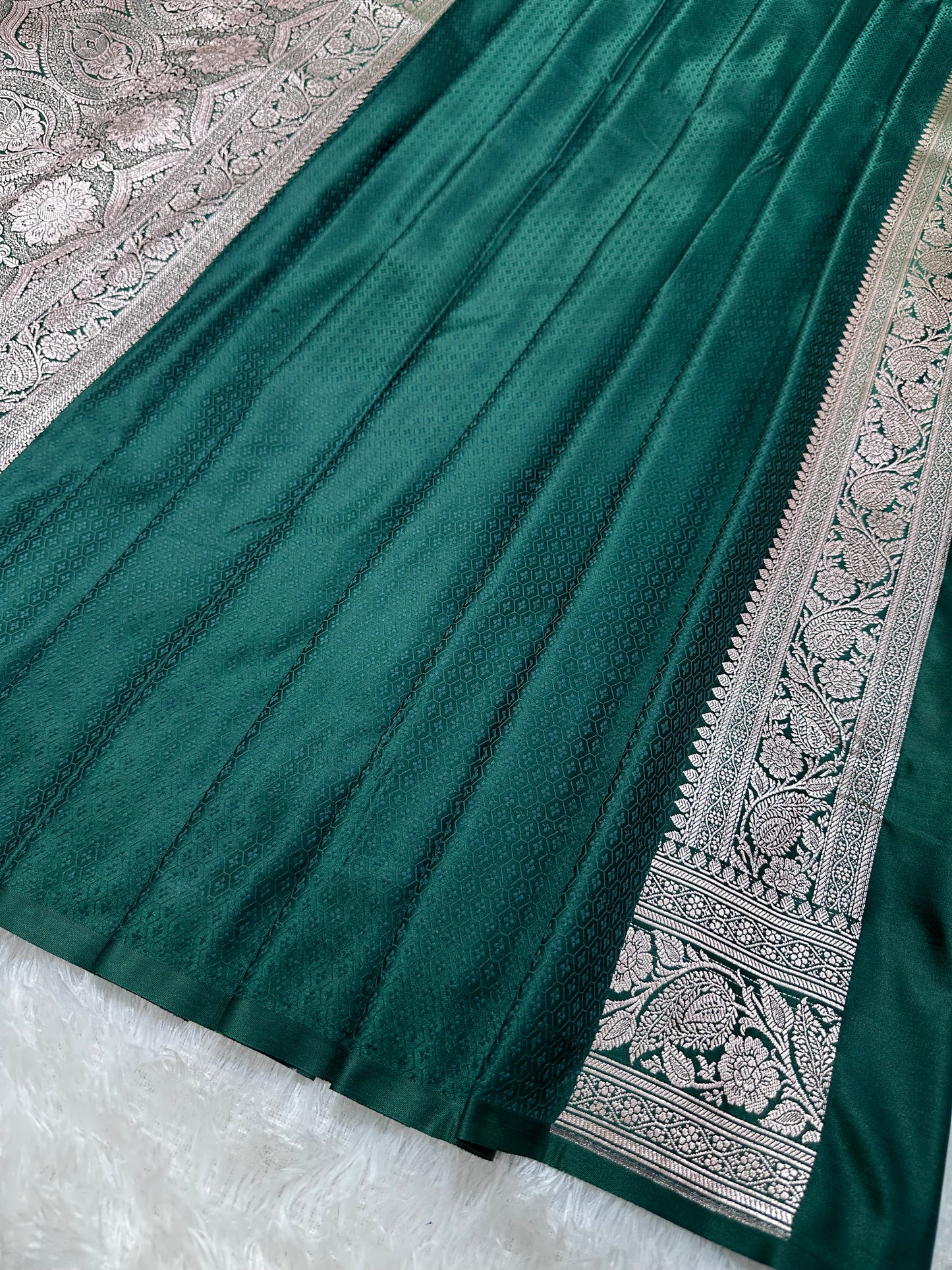 Bottle Green Katan Silk Banarasi Saree with Heritage Copper Zari Kalka Bel Border and Sleek Leaf Sprigs