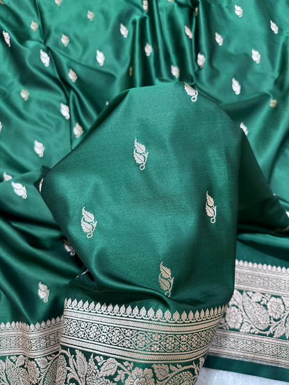 Bottle Green Katan Silk Banarasi Saree with Heritage Copper Zari Kalka Bel Border and Sleek Leaf Sprigs