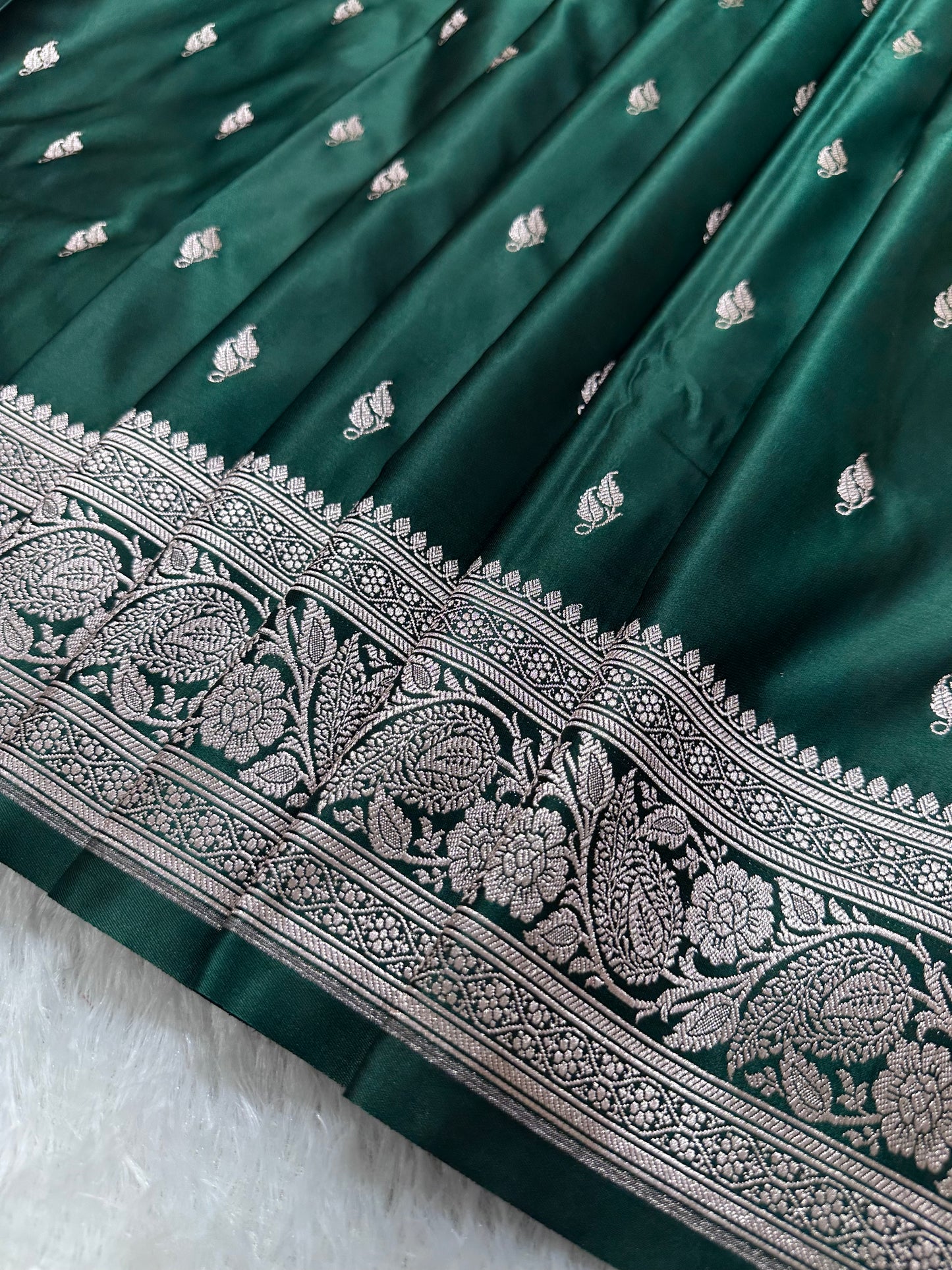 Bottle Green Katan Silk Banarasi Saree with Heritage Copper Zari Kalka Bel Border and Sleek Leaf Sprigs