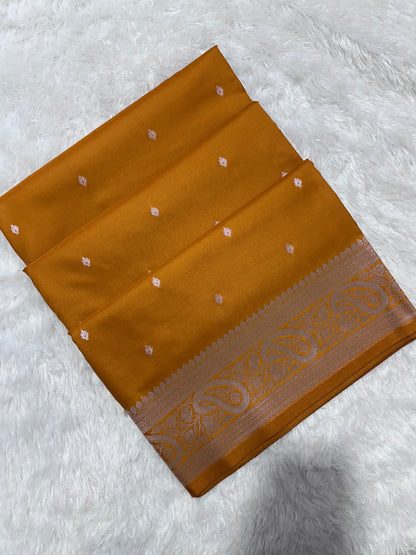 Mustard Orange Katan Silk Banarasi Saree with Classic Copper Zari Kalka Bel Border and Sleek Micro-Butis