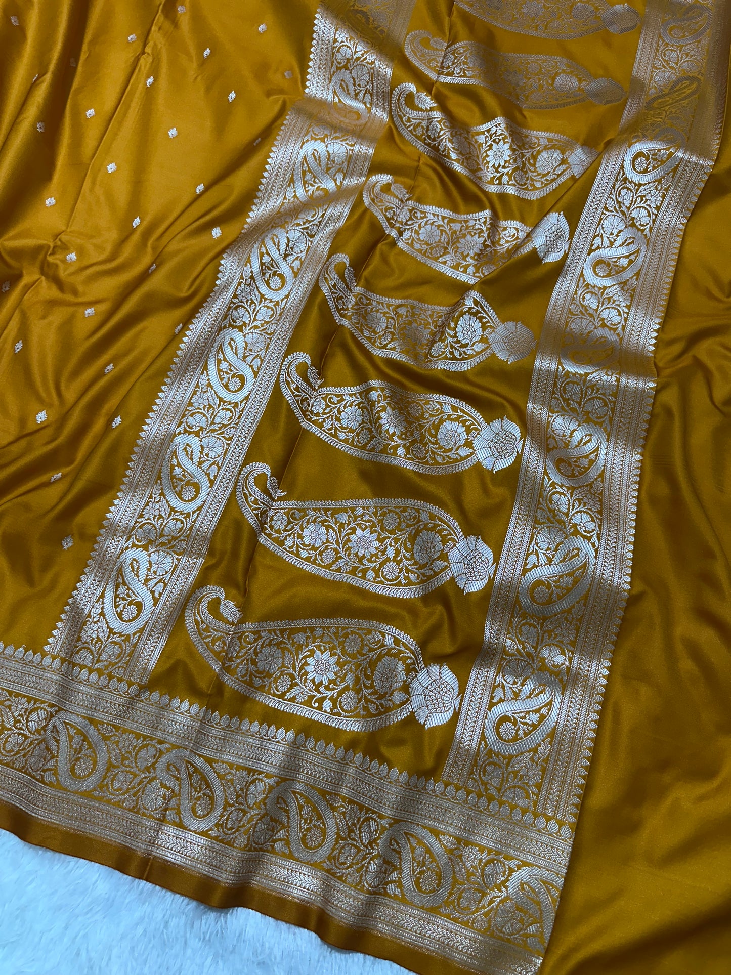 Mustard Orange Katan Silk Banarasi Saree with Classic Copper Zari Kalka Bel Border and Sleek Micro-Butis