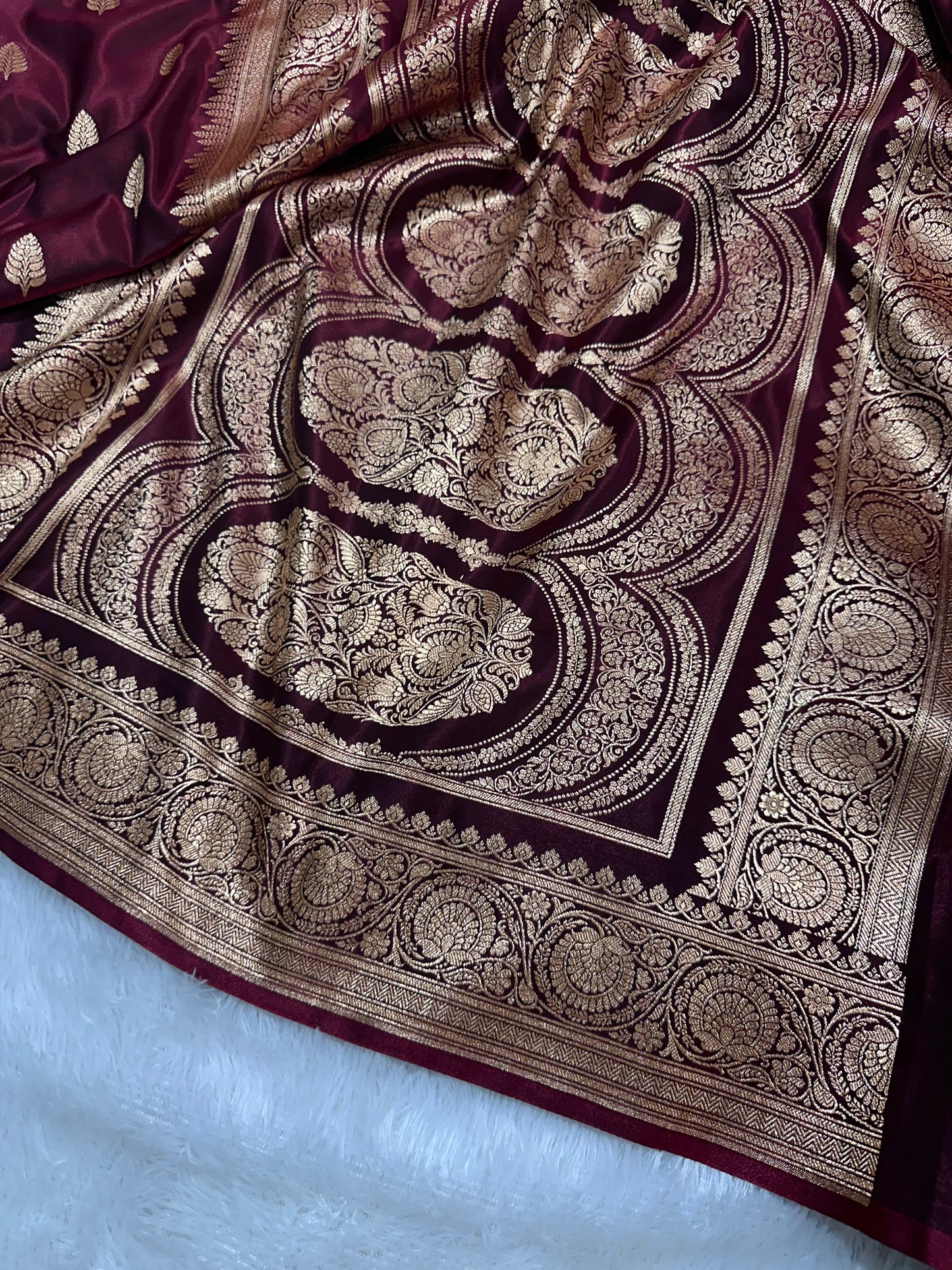 Garnet Satin Silk Banarasi Saree with Royal Guldasta Chakra Border and Bold Gold Panna Butis