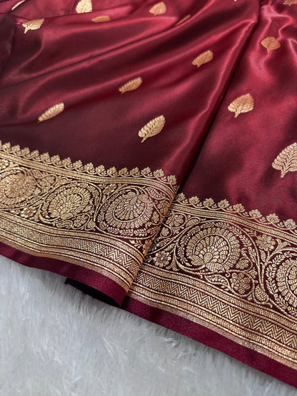 Garnet Satin Silk Banarasi Saree with Royal Guldasta Chakra Border and Bold Gold Panna Butis
