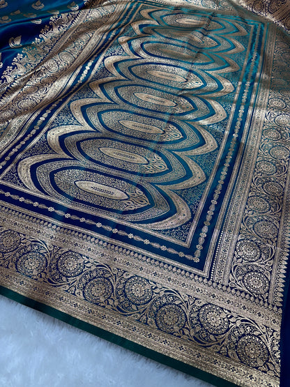 Peacock Dual-Tone Satin Silk Banarasi Saree with Royal Guldasta Chakra Border and Bold Gold Panna Butis