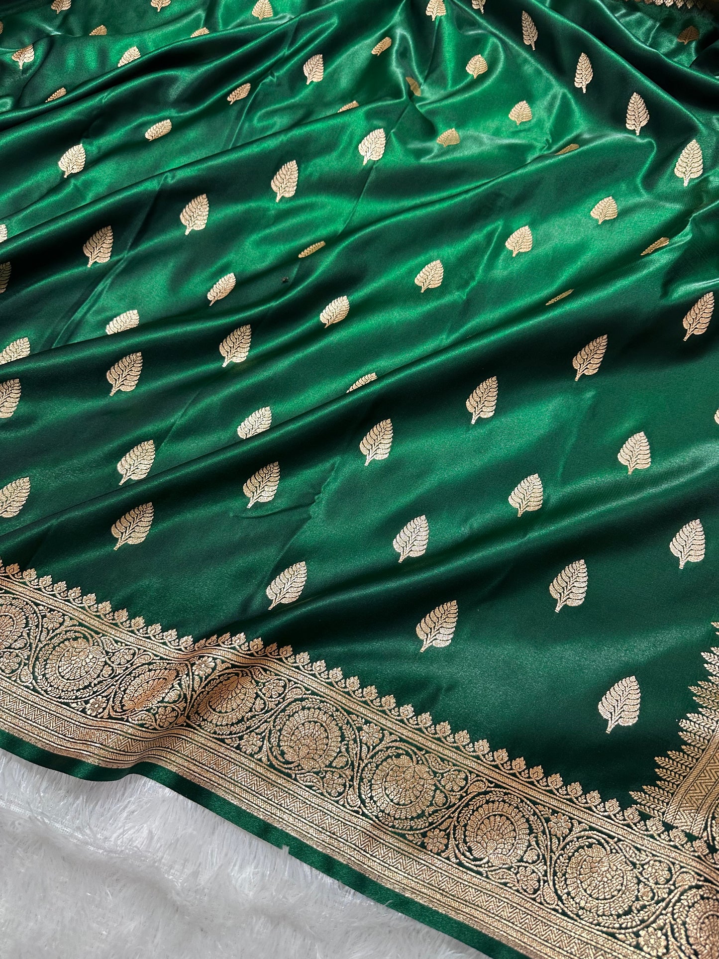 Bottle Green Satin Silk Banarasi Saree with Royal Guldasta Chakra Border and Bold Gold Panna Butis