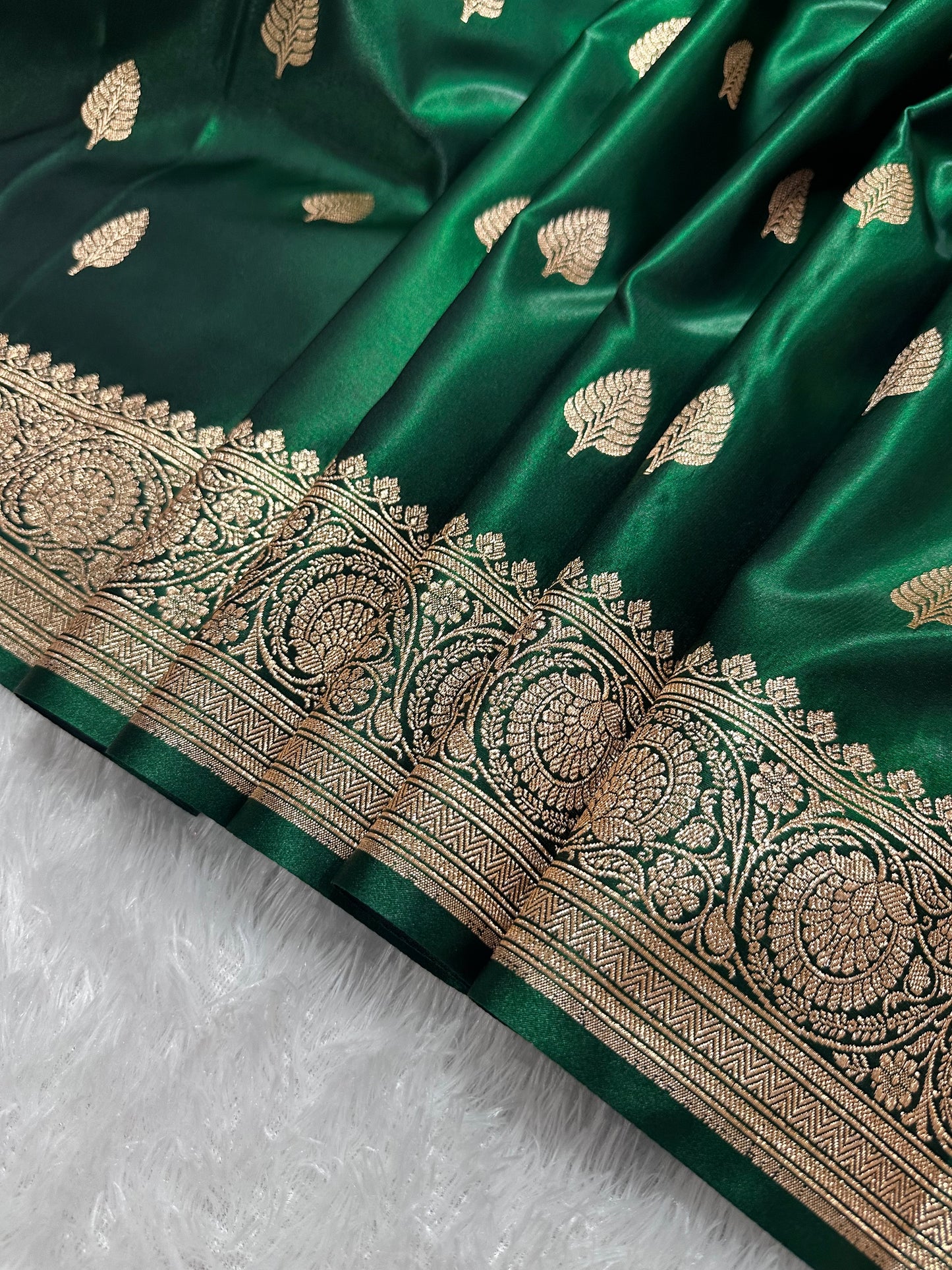 Bottle Green Satin Silk Banarasi Saree with Royal Guldasta Chakra Border and Bold Gold Panna Butis