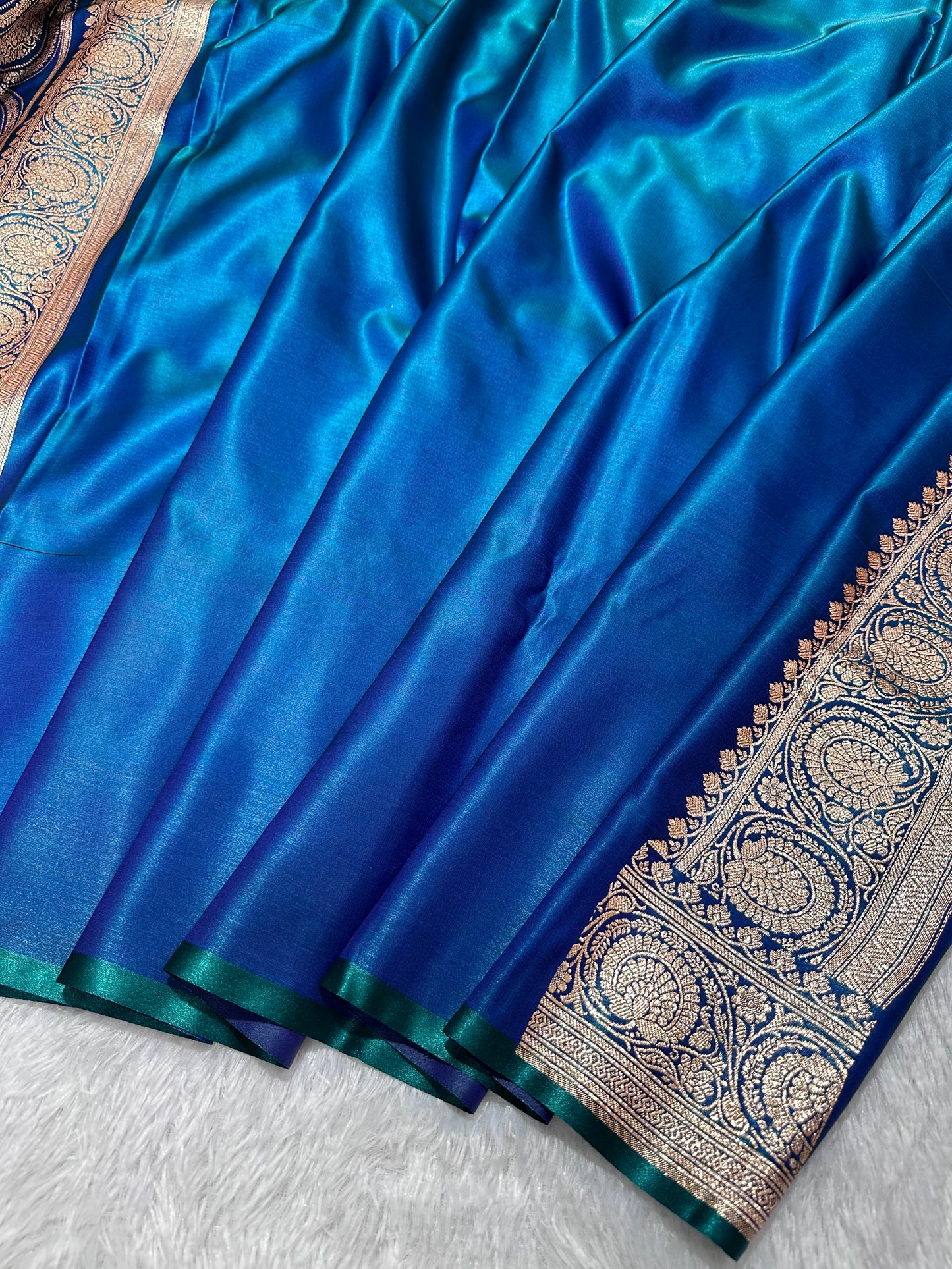 Royal Peacock Blue Satin Silk Banarasi Saree with Royal Guldasta Chakra Border and Bold Gold Panna Butis