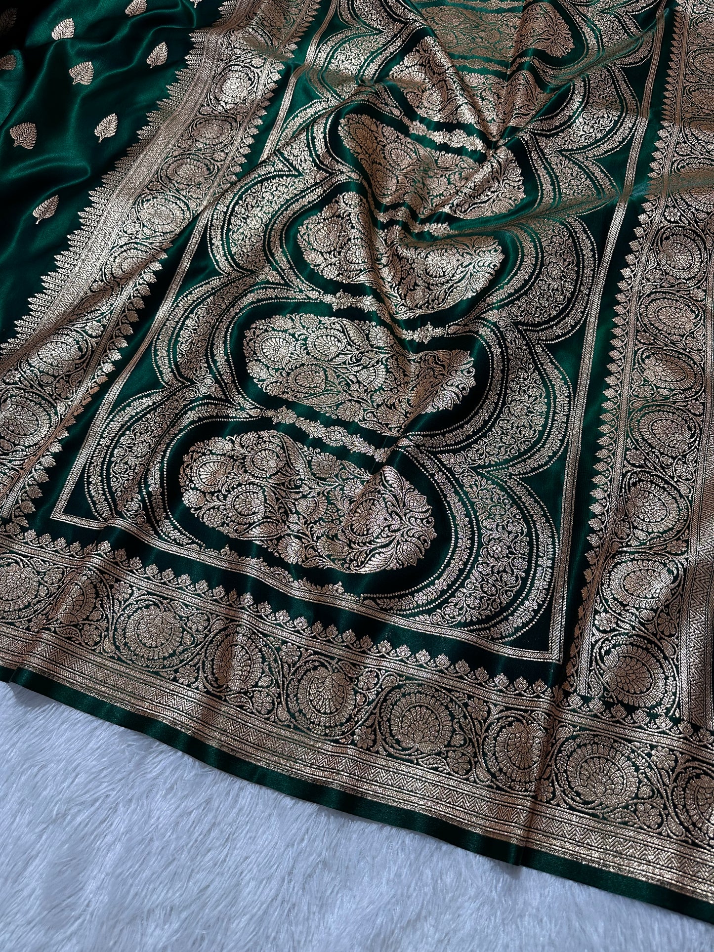 Classic Bottle Green Satin Silk Banarasi Saree with Royal Guldasta Chakra Border and Bold Gold Panna Butis
