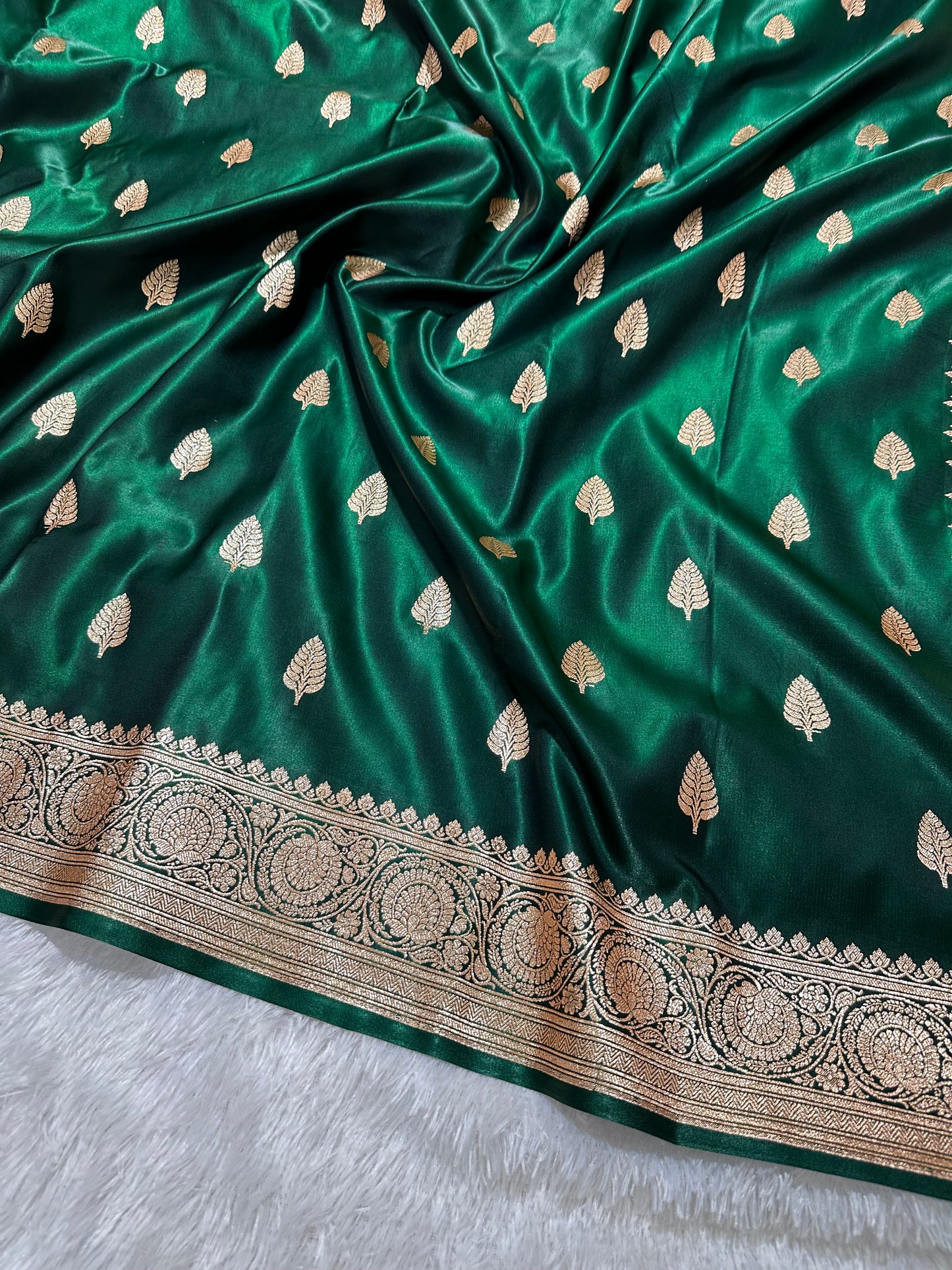 Classic Bottle Green Satin Silk Banarasi Saree with Royal Guldasta Chakra Border and Bold Gold Panna Butis