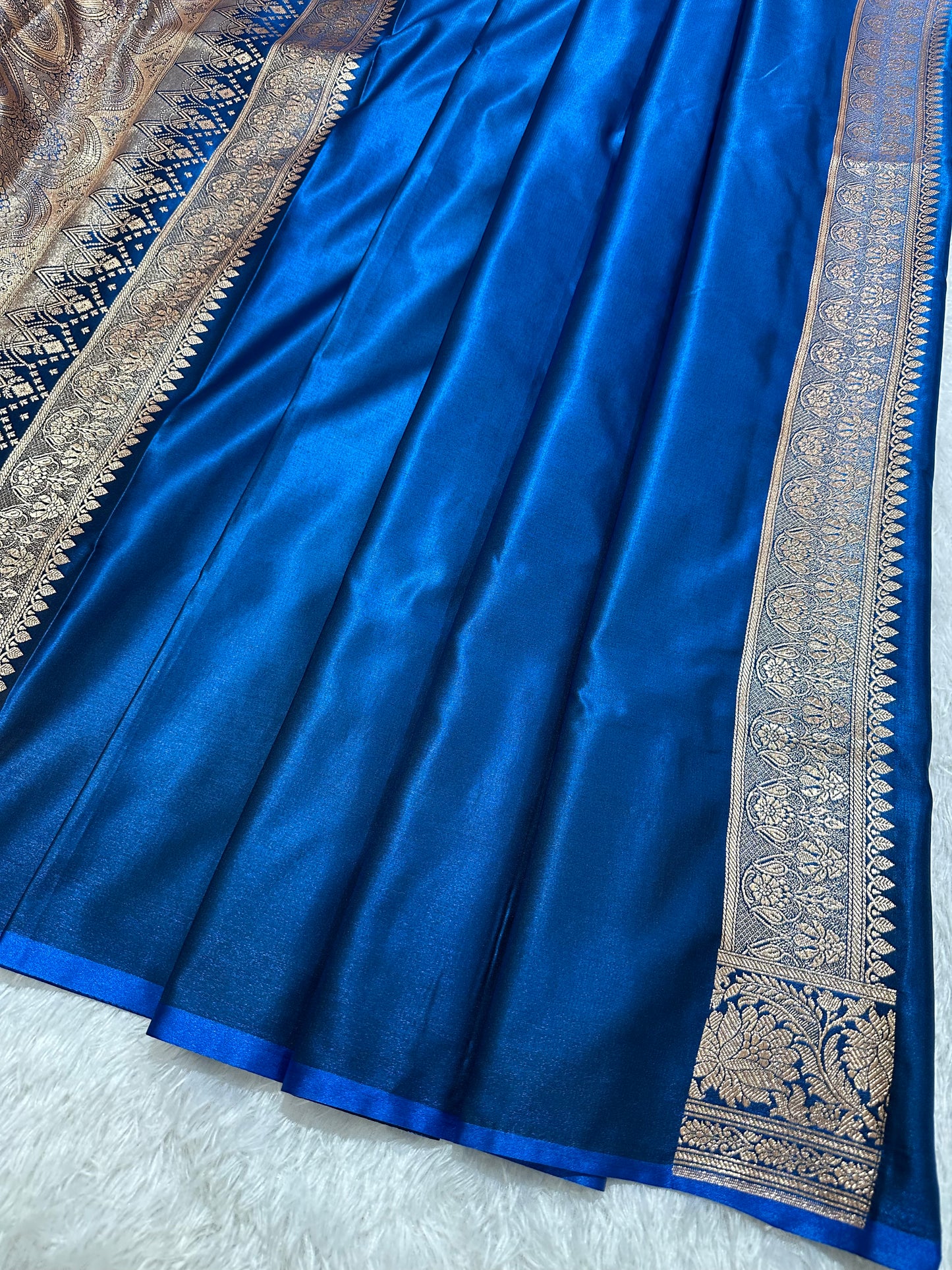 Royal Peacock Blue Satin Silk Banarasi Saree with Royal Floral Jhallar Border and Royal Peacock Paisley Butis
