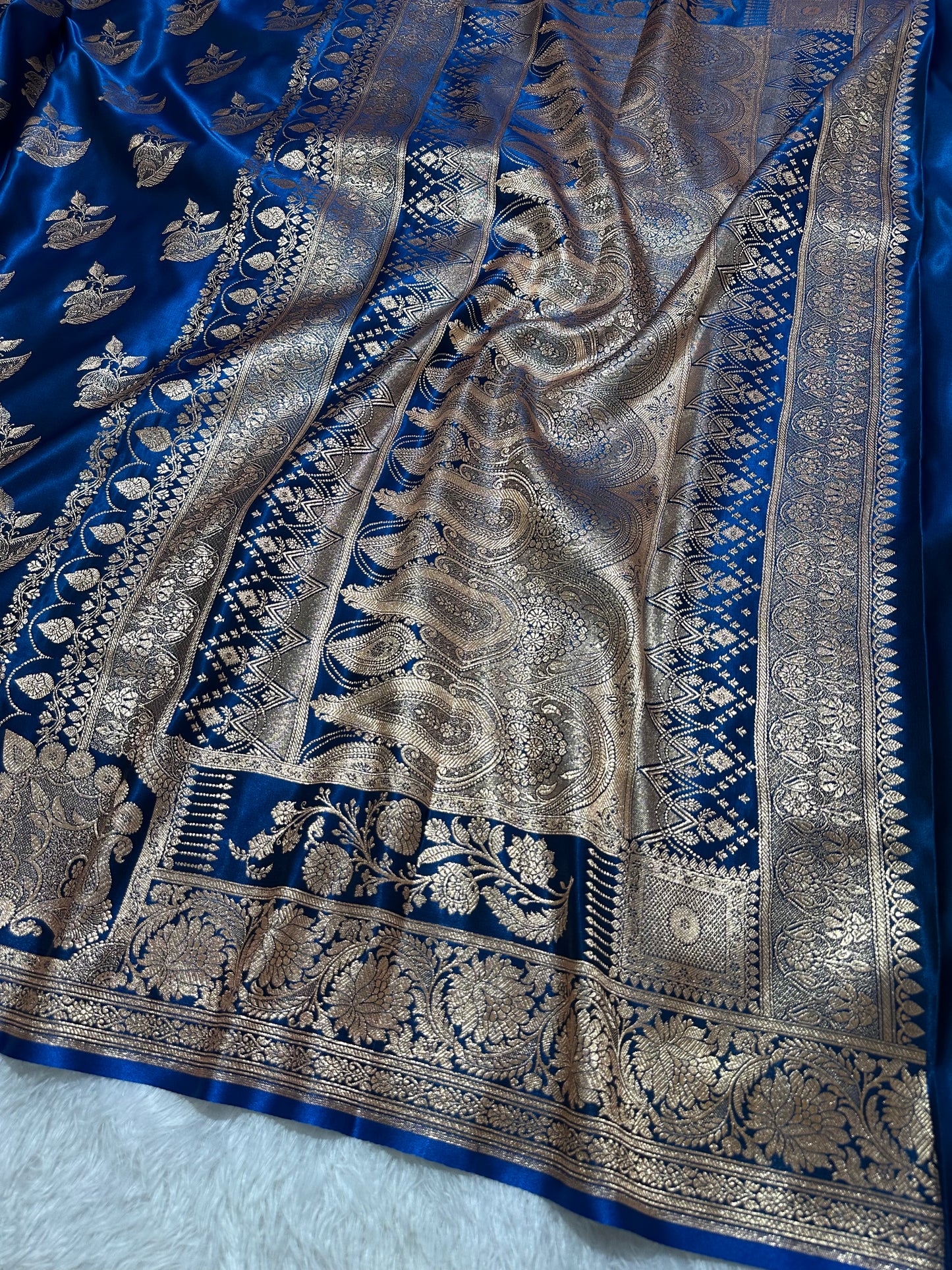 Royal Peacock Blue Satin Silk Banarasi Saree with Royal Floral Jhallar Border and Royal Peacock Paisley Butis