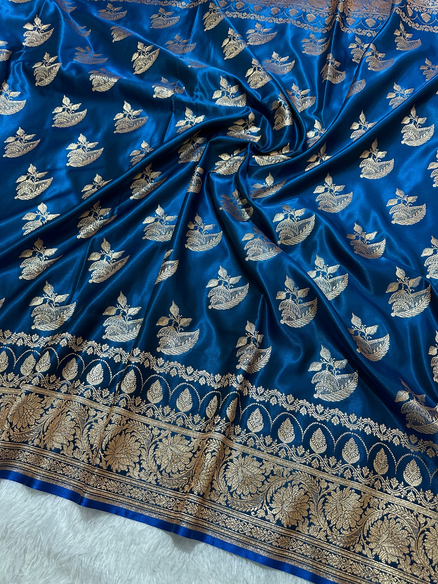 Royal Peacock Blue Satin Silk Banarasi Saree with Royal Floral Jhallar Border and Royal Peacock Paisley Butis
