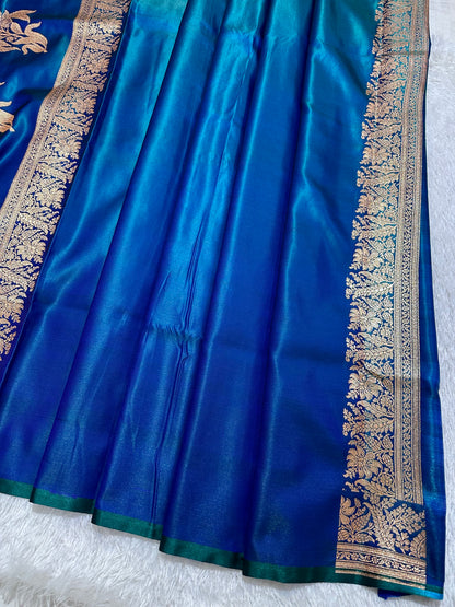 Royal Peacock Blue Satin Silk Banarasi Saree with Delicate Floral Arch Border and Traditional Kalka Butis