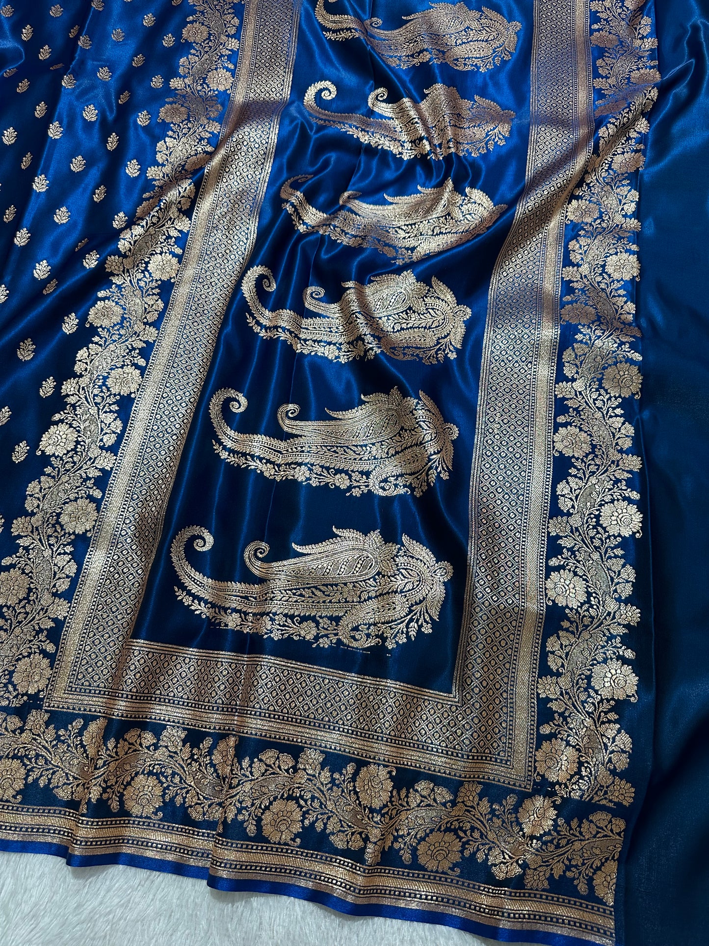 Royal Ink Blue Satin Silk Banarasi Saree with Delicate Floral Arch Border and Full-Bloomed Rose Butis