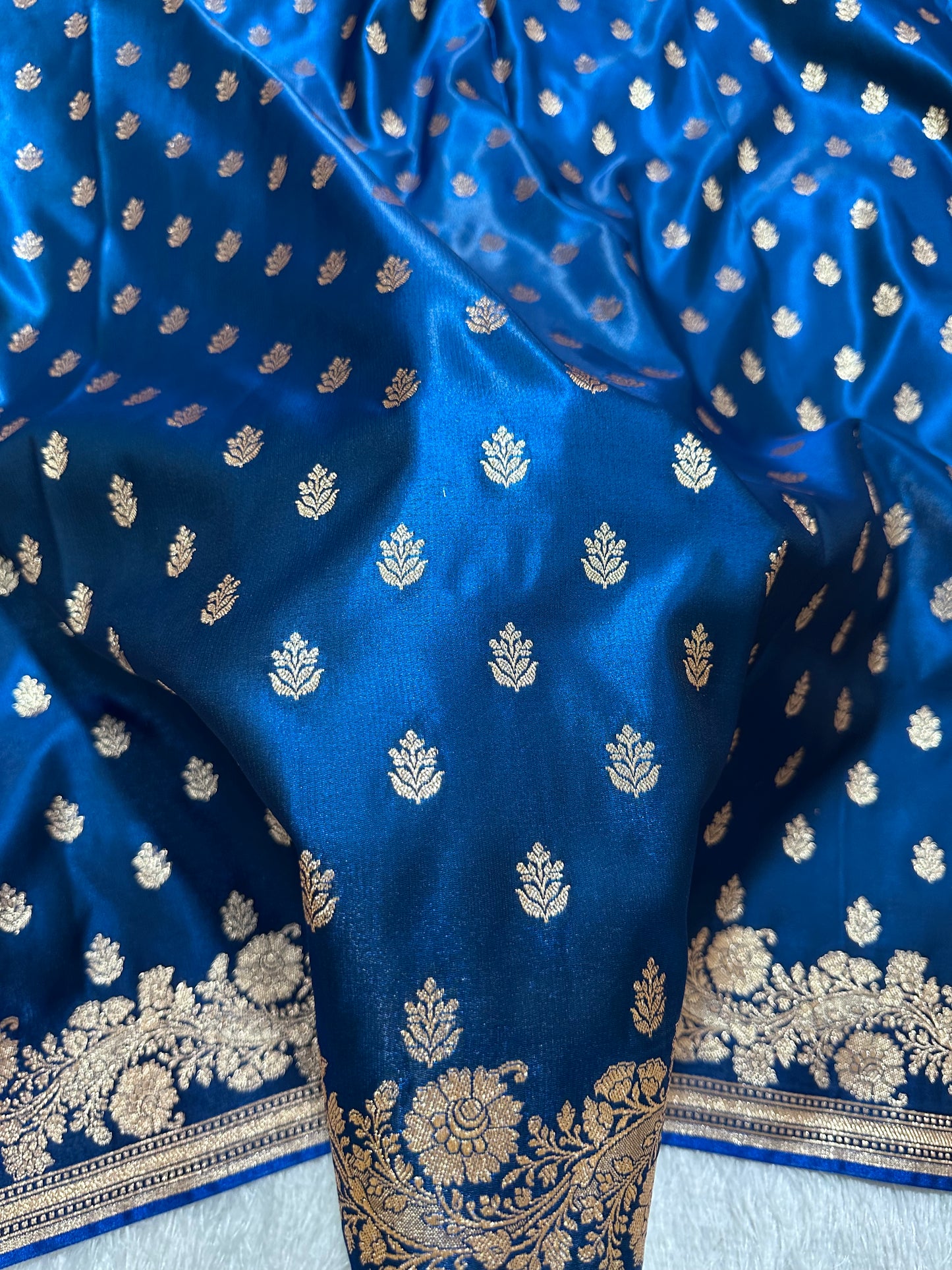 Royal Ink Blue Satin Silk Banarasi Saree with Delicate Floral Arch Border and Full-Bloomed Rose Butis
