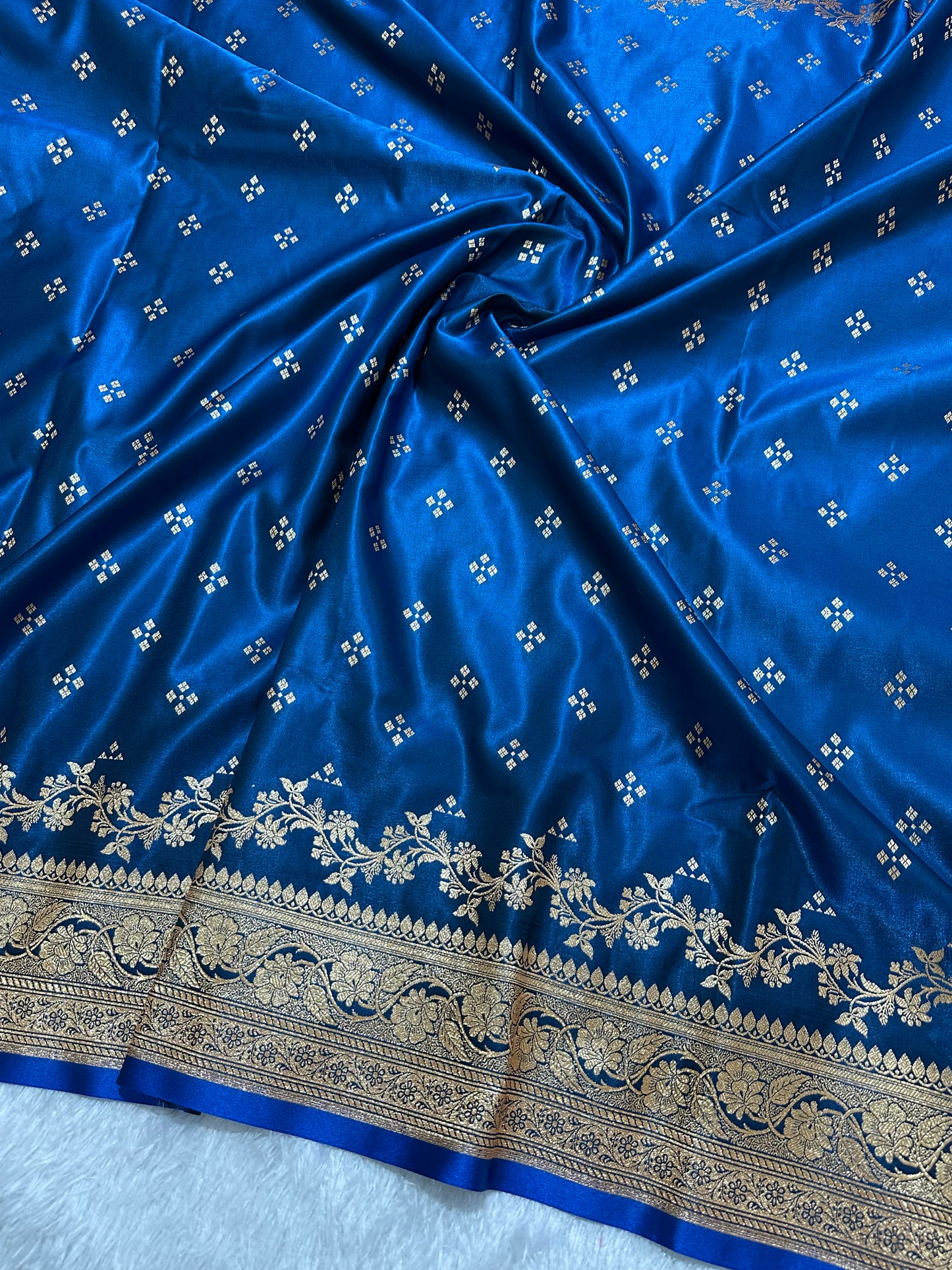 Royal Peacock Blue Satin Silk Banarasi Saree with Royal Floral Jhallar Border and Geometric Chowk Butis