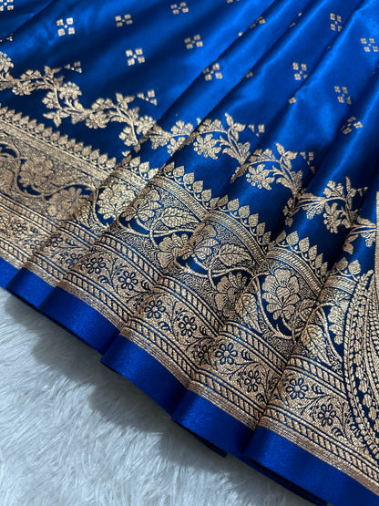 Royal Peacock Blue Satin Silk Banarasi Saree with Royal Floral Jhallar Border and Geometric Chowk Butis