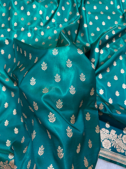 Elegant Rama Green Satin Silk Banarasi Saree with Delicate Floral Arch Border and Full-Bloomed Rose Butis