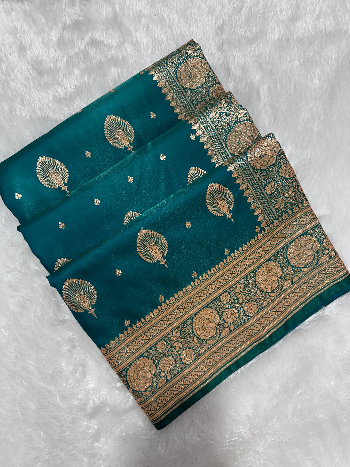 Elegant Rama Green Satin Silk Banarasi Saree with Royal Meena-Floral Border and Ornate Peacock Feather Butis