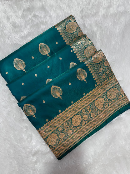 Elegant Rama Green Satin Silk Banarasi Saree with Royal Meena-Floral Border and Ornate Peacock Feather Butis