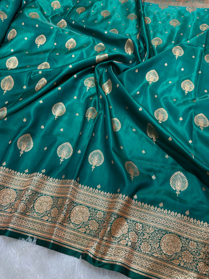 Elegant Rama Green Satin Silk Banarasi Saree with Royal Meena-Floral Border and Ornate Peacock Feather Butis