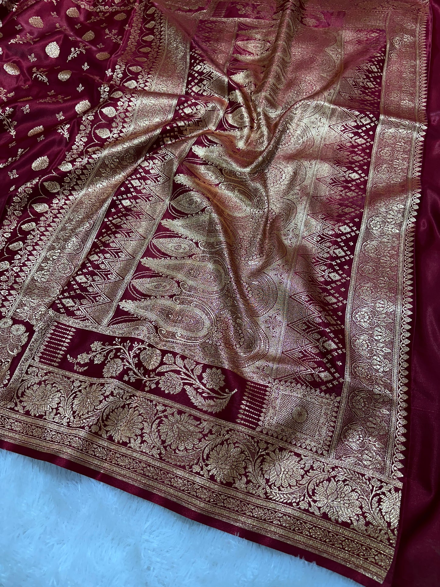 Bridal Maroon Satin Silk Banarasi Saree with Royal Floral Jhallar Border and Traditional Kalka-Floral Sprig Body Work