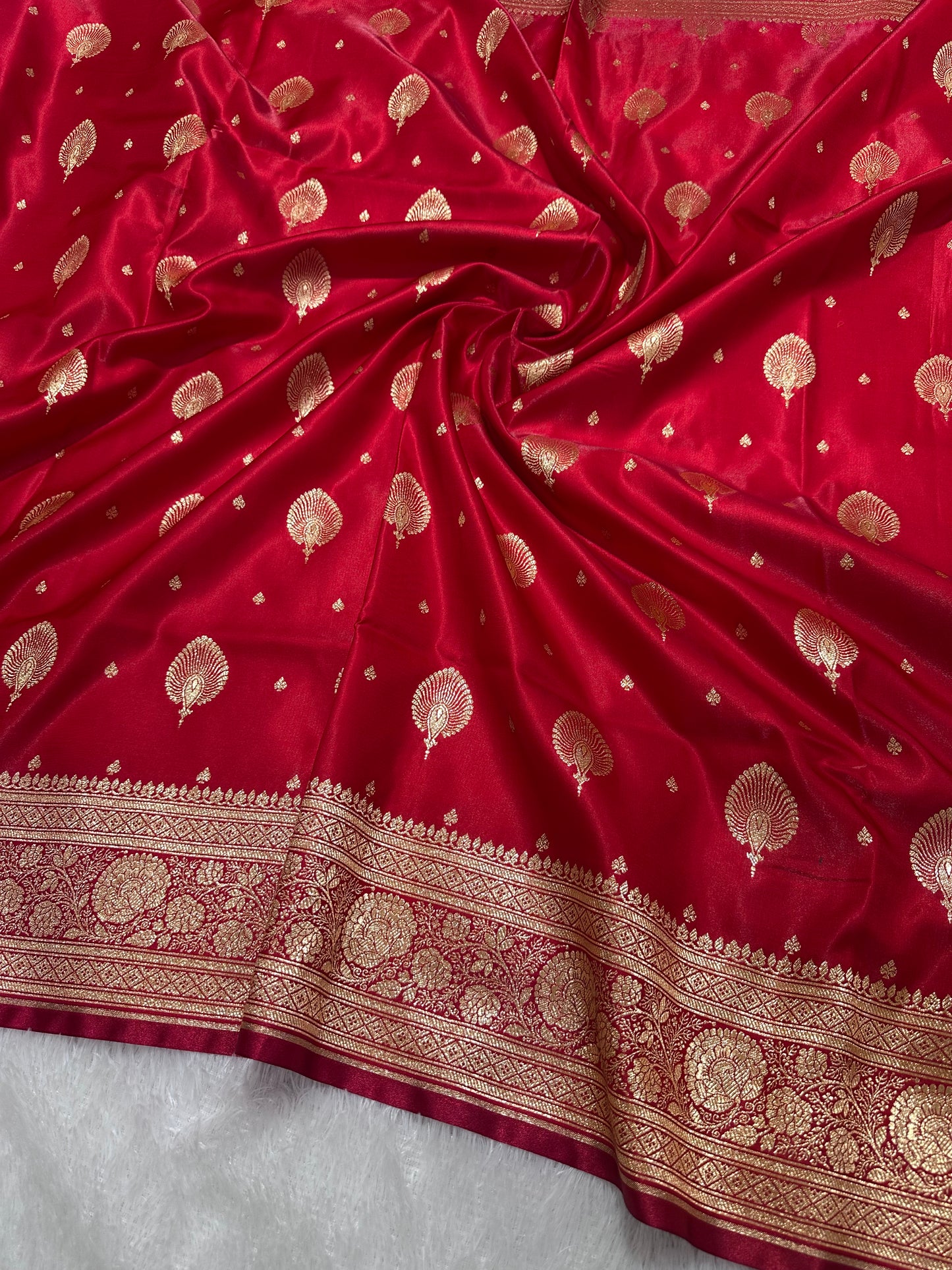 Elegant Crimson Red Satin Silk Banarasi Saree with Royal Meena-Floral Border and Ornate Peacock Feather Butis