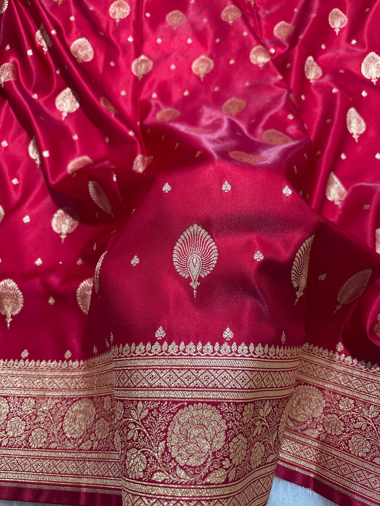 Elegant Crimson Red Satin Silk Banarasi Saree with Royal Meena-Floral Border and Ornate Peacock Feather Butis