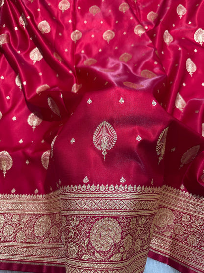 Elegant Crimson Red Satin Silk Banarasi Saree with Royal Meena-Floral Border and Ornate Peacock Feather Butis