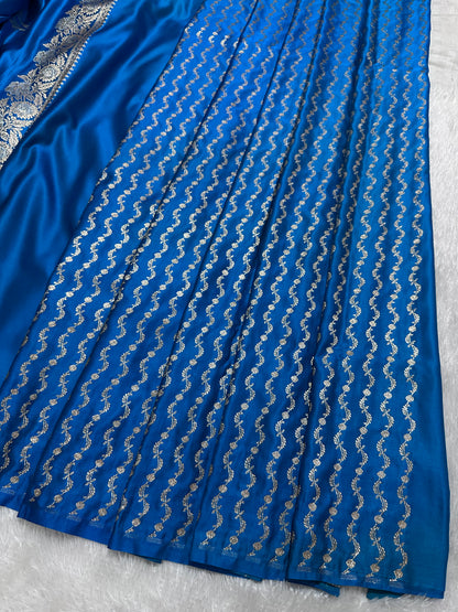 Elegant Firozi Blue Katan Silk Banarasi Saree with Delicate Floral Arch Border and Traditional Bouquet Leaf Butis