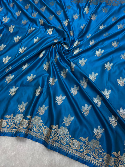 Elegant Firozi Blue Katan Silk Banarasi Saree with Delicate Floral Arch Border and Traditional Bouquet Leaf Butis