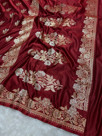 Elegant Maroon Katan Silk Banarasi Saree with Delicate Floral Arch Border and Traditional Bouquet Leaf Butis