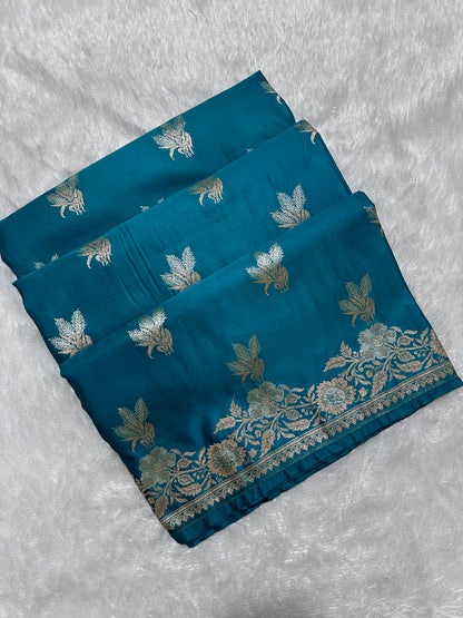 Premium Peacock Blue Katan Silk Banarasi Saree with Delicate Floral Arch Border and Traditional Bouquet Leaf Butis