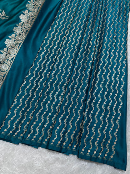 Premium Peacock Blue Katan Silk Banarasi Saree with Delicate Floral Arch Border and Traditional Bouquet Leaf Butis